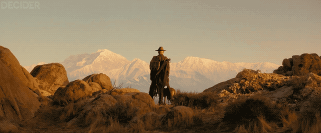 Гуль и его собака смотрят на Скалистые горы