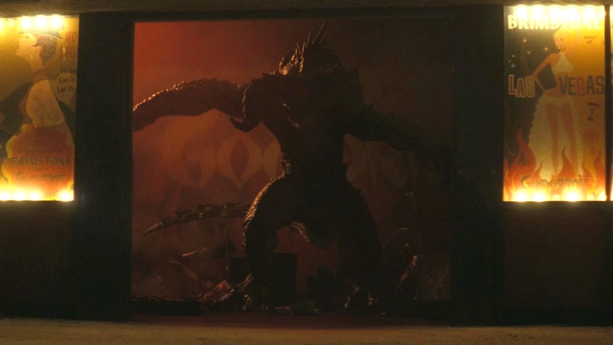 Коготь смерти на фоне огня